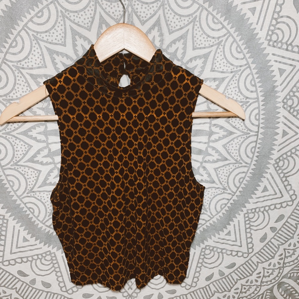 Black and gold cropped blouse with no sleeves